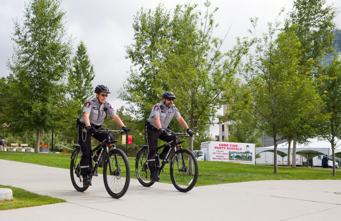 Security officers Jean Beaudoin and Tesha Ligren are the first non-police officers to complete instructor training for bike units in Colorado.